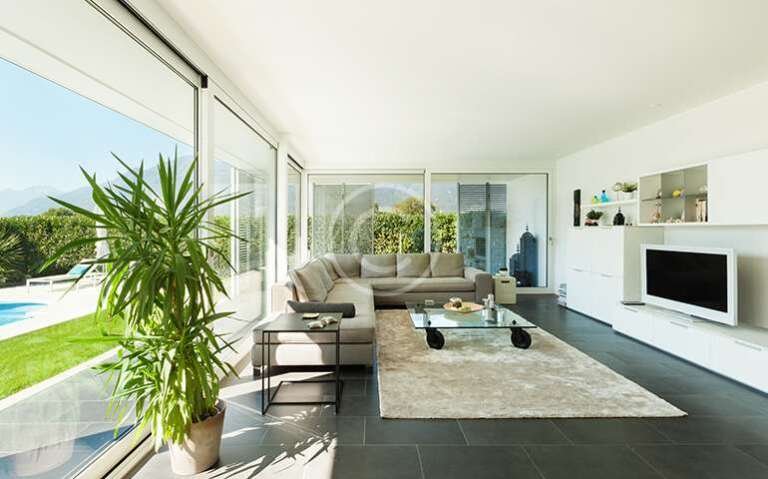 Living room with large sliding glass doors and natural light